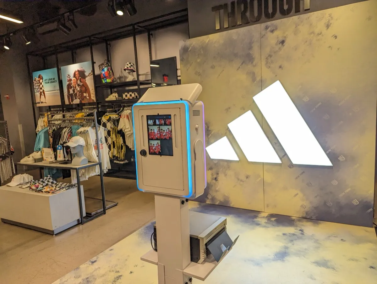 Adidas in-store photo booth brand activation NYC with custom branded backdrop