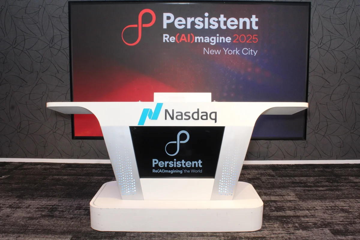 Custom branded photo booth kiosk at Persistent Systems Re(AI)magine 2025 conference at Nasdaq New York City