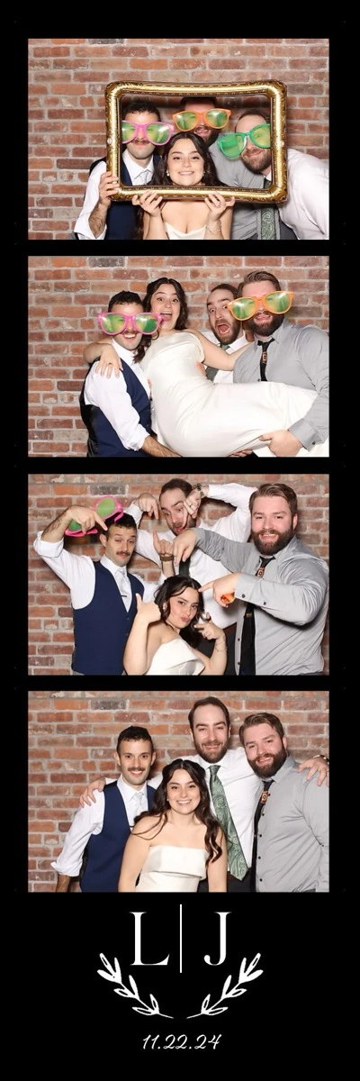 2x6 wedding photo strip with black frame and brick wall backdrop