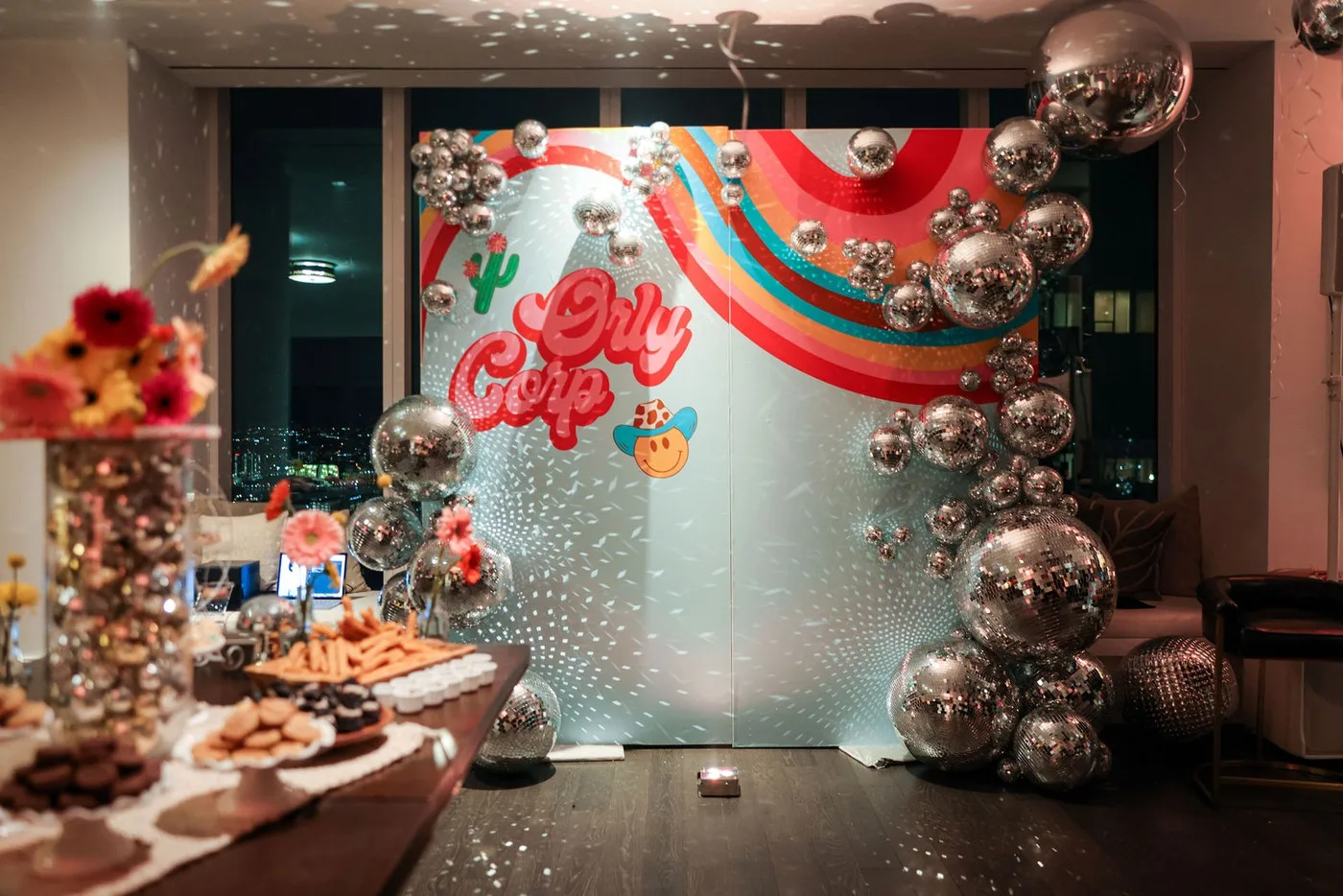Branded balloon backdrop at a corporate holiday party in New York City