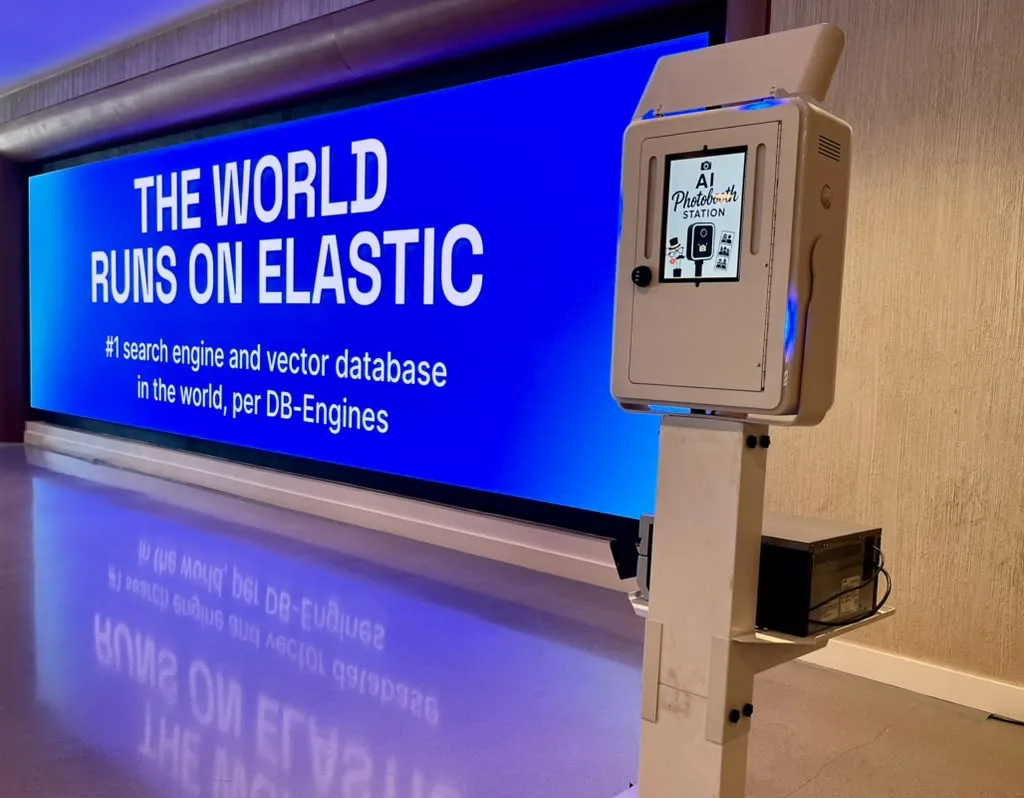 AI photo booth station in front of an Elastic brand display at a corporate activation