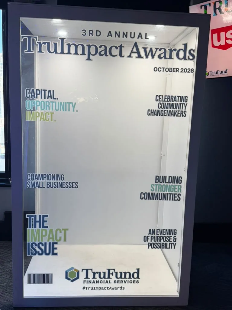 Walk-in magazine photo booth with a custom TruImpact Awards cover for TruFund Financial Services